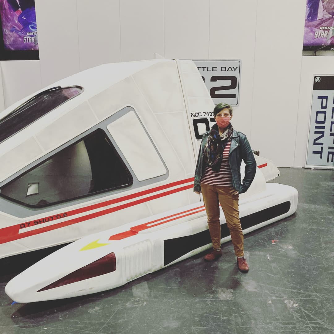 Me standing beside a shuttle at a Star Trek convention